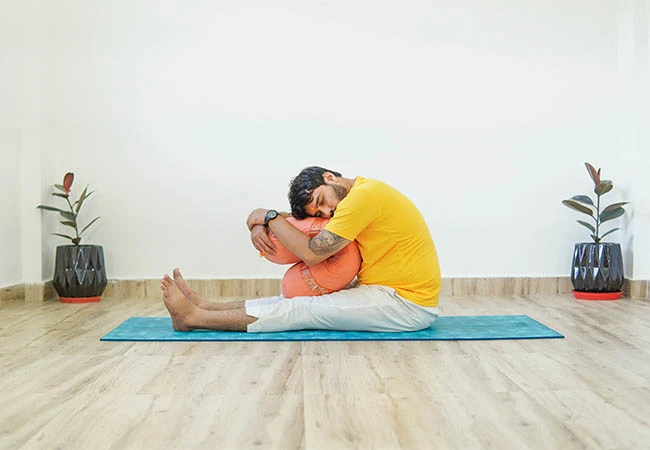 Yin Yoga TTC supported sitting forward bend