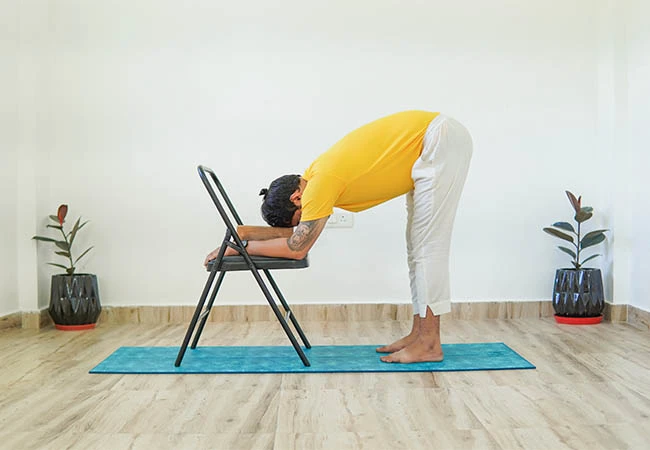 Yin Yoga TTC supported standing forward bend